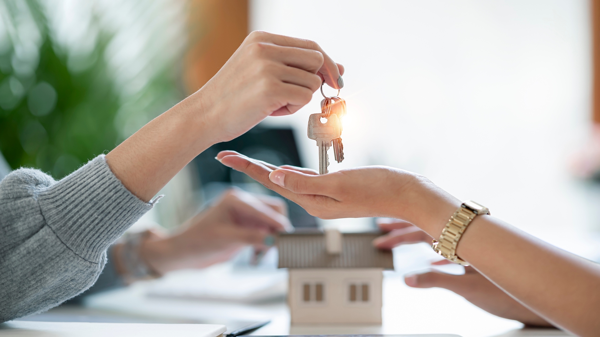 women holding key